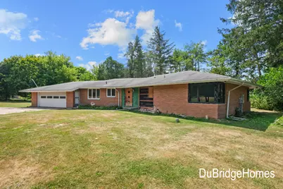 311 Honey Creek Avenue SE, Ada, MI 49301 - Photo 1