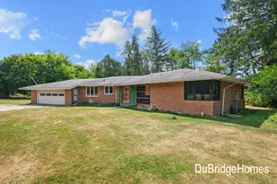 311 Honey Creek Ave SE, Ada, MI 49301 - Photo 1