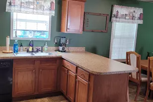 7309 White Swan Ln, Ludington, MI 49431 - Photo 11