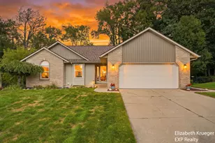 1031 Legacy NE, Comstock Park, MI 49321 - Photo 1