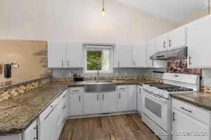 9520 Hidden Bluff Dr NE, Rockford, MI 49341 - Photo 13