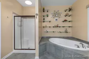 9520 Hidden Bluff Dr NE, Rockford, MI 49341 - Photo 21