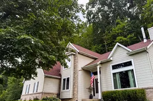 8824 Grand River Dr SE, Ada, MI 49301 - Photo 1