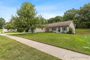 469 Country Meadows Dr NE, Comstock Park, MI 49321 - Photo 3