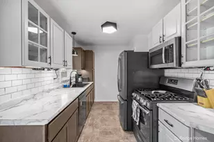 977 Coventry Dr NW, Grand Rapids, MI 49544 - Photo 5