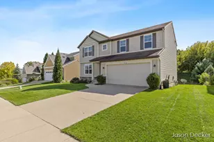 518 Orchard Dr NE, Rockford, MI 49341 - Photo 3