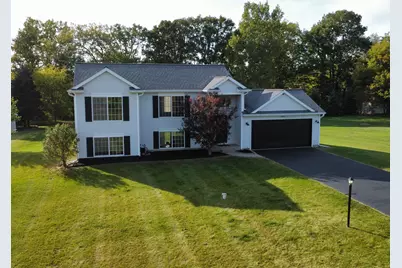14735 Ivorystone Drive NE, Cedar Springs, MI 49319 - Photo 1