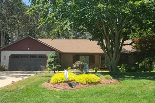 12087 Sandy Woods Dr, Grand Haven, MI 49417 - Photo 1