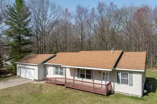 6565 Club House Dr E, Canadian Lakes, MI 49346 - Photo 1