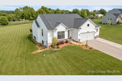 9198 Wabasis Pointe Drive NE, Greenville, MI 48838 - Photo 1