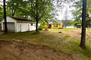 7777 N Manitonka Dr, Weidman, MI 48893 - Photo 1