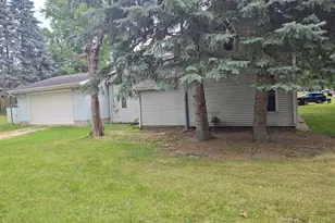 203 E Home St, Edmore, MI 48829 - Photo 1