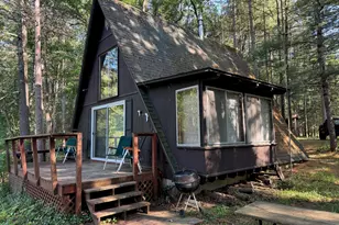 8160 W River Rd, Irons, MI 49644 - Photo 1