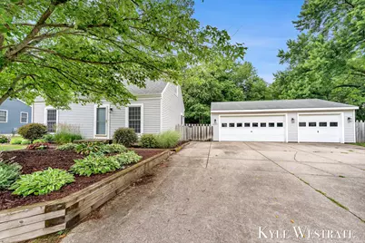 11129 Woodbushe Drive SE, Lowell, MI 49331 - Photo 1