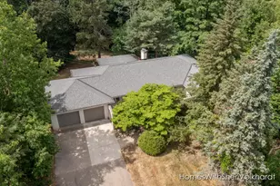 303 4 Mile Rd NW, Comstock Park, MI 49321 - Photo 1