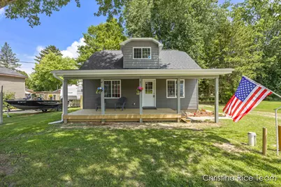 118 Clark Street, Six Lakes, MI 48886 - Photo 1