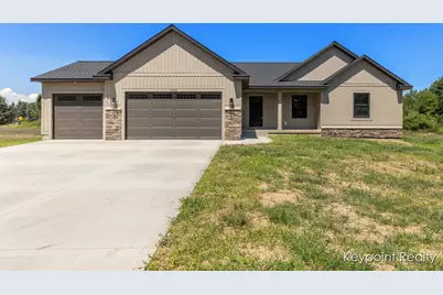 1233 Secluded Pines Drive, Sparta, MI 49345 - Photo 1