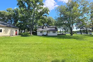 148 E Channel Dr, Sheridan, MI 48884 - Photo 1