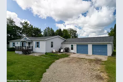 9019 Musson Road, Six Lakes, MI 48886 - Photo 1