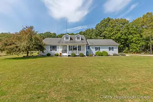 7731 Musson Rd, Six Lakes, MI 48886 - Photo 1