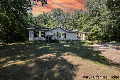 5862 E River Road, Twin Lake, MI 49457 - Photo 1