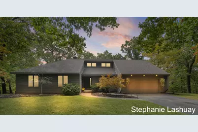 8823 Vergennes Street SE, Ada, MI 49301 - Photo 1