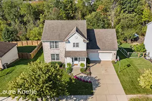 165 Hawthorne Ct NE, Rockford, MI 49341 - Photo 1