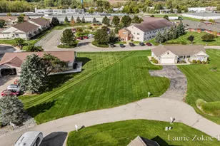 243 W Gardner Street NW, Sparta, MI 49345 - Photo 1