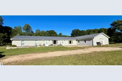 10911 E Lake Montcalm Rd, Riverdale, MI 48877 - Photo 1