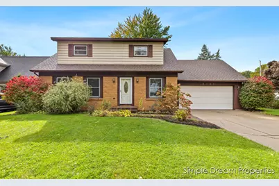 5709 Pineknoll Court SE, Kentwood, MI 49508 - Photo 1