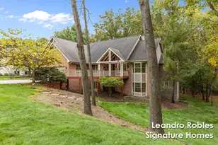 2875 Riverwoods Dr NE, Rockford, MI 49341 - Photo 1