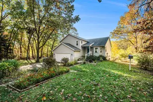 10930 Settlewood Dr SE, Lowell, MI 49331 - Photo 1