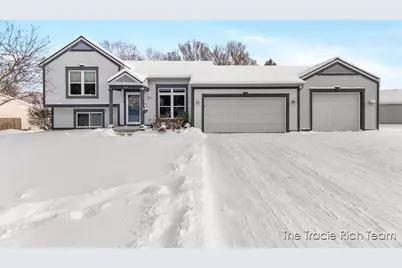 831 Scott Woods Drive NE, Comstock Park, MI 49321 - Photo 1