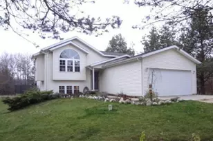 7433 Rolling Pines Rd, Howard City, MI 49329 - Photo 1