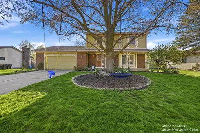 3879 Basswood Drive SW, Grandville, MI 49418 - Photo 1