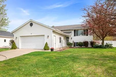 83 Windflower Street NE, Comstock Park, MI 49321 - Photo 1
