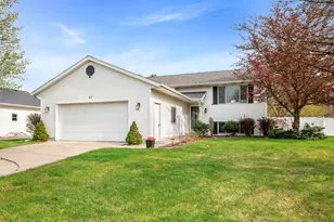 83 Windflower St NE, Comstock Park, MI 49321 - Photo 1