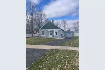 166 S Pleasant Street, Lowell, MI 49331 - Photo 1