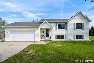 75 Cleveland Street E, Coopersville, MI 49404 - Photo 1