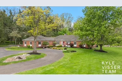 1585 River Oaks Drive SE, Ada, MI 49301 - Photo 1