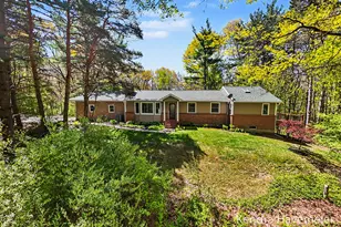 8261 Bush Dr NE, Rockford, MI 49341 - Photo 1