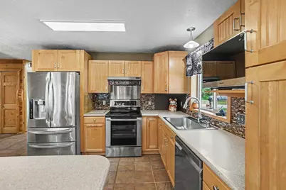 2000 Granada Court, Weidman, MI 48893 - Photo 1