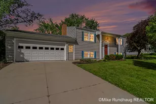723 Marbury Dr SE, Ada, MI 49301 - Photo 1
