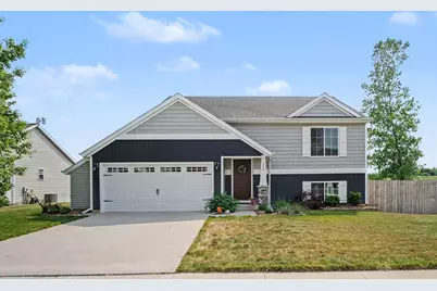 264 Vansen Drive NW, Kent City, MI 49330 - Photo 1