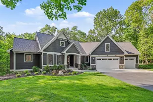 547 Roundtree Dr NE, Ada, MI 49301 - Photo 1
