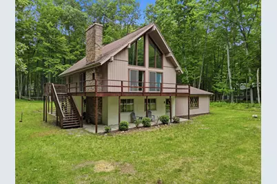 9352 W Circle Drive, Canadian Lakes, MI 49346 - Photo 1