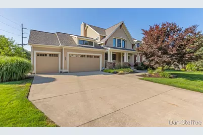 4878 W Village Trail SE, Ada, MI 49301 - Photo 1