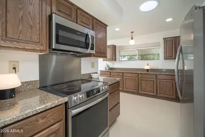 9506 W Country Club Drive W, Sun City, AZ 85373 - Photo 17