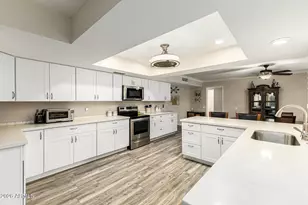 21002 N Palm Desert Dr, Sun City West, AZ 85375 - Photo 13
