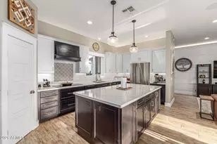 7042 N Cotton Ln, Waddell, AZ 85355 - Photo 13